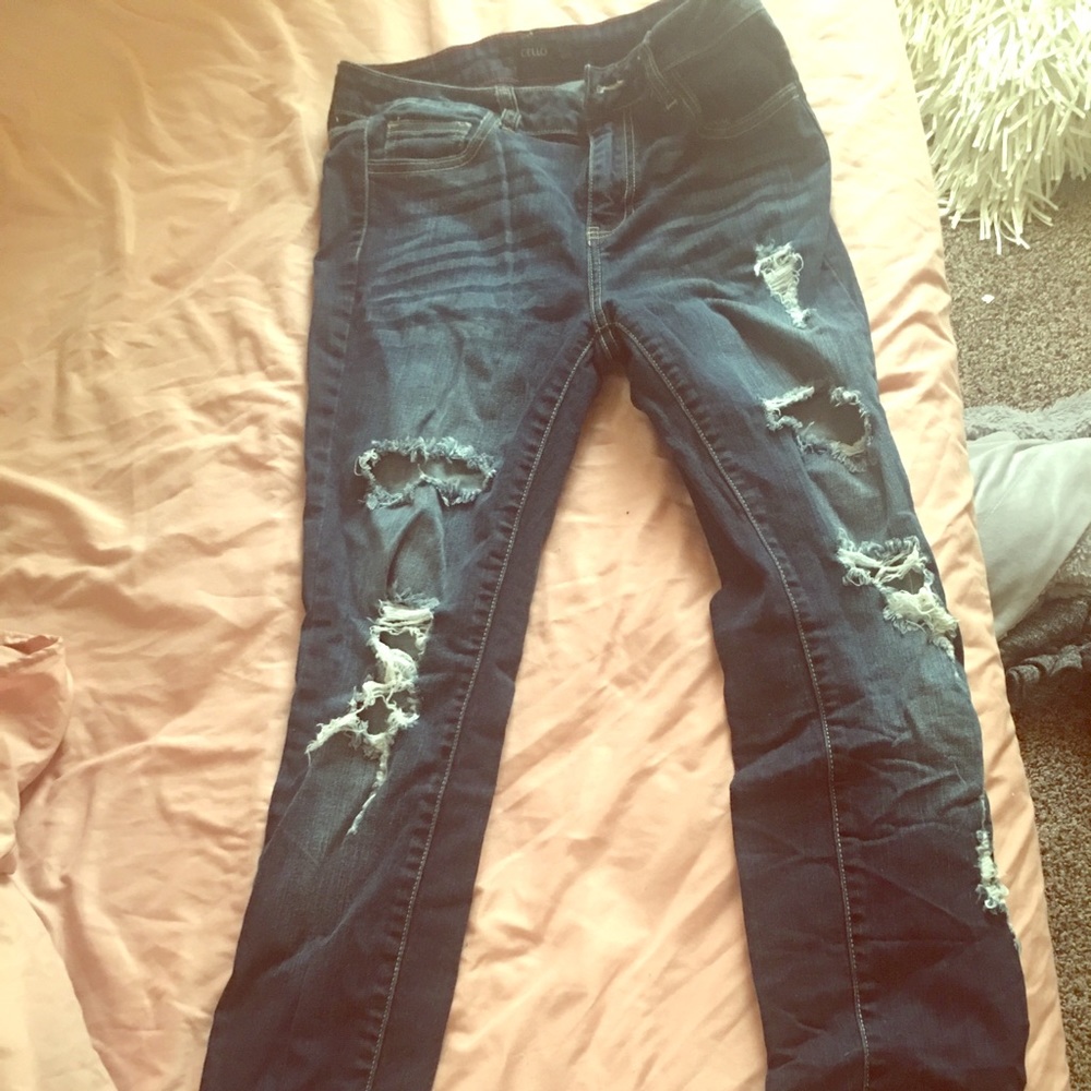 Dark blue ripped jeans